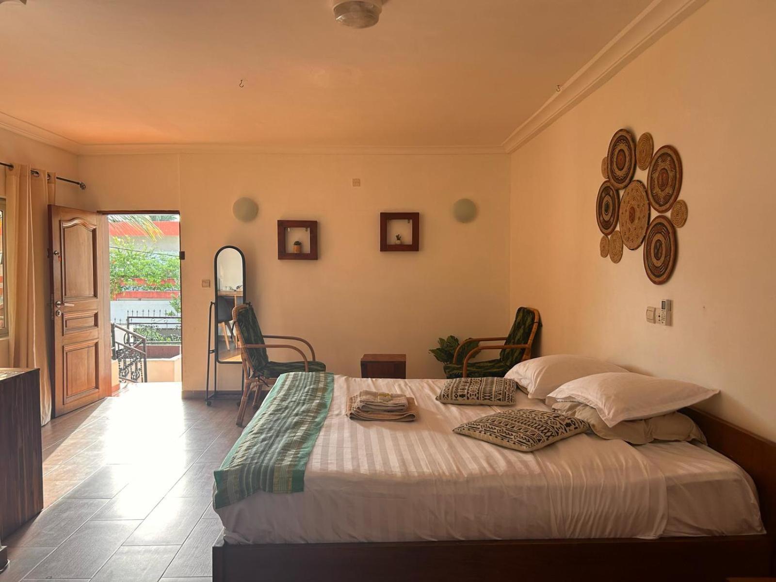 L'Oasis Guesthouse Cotonou Exterior photo